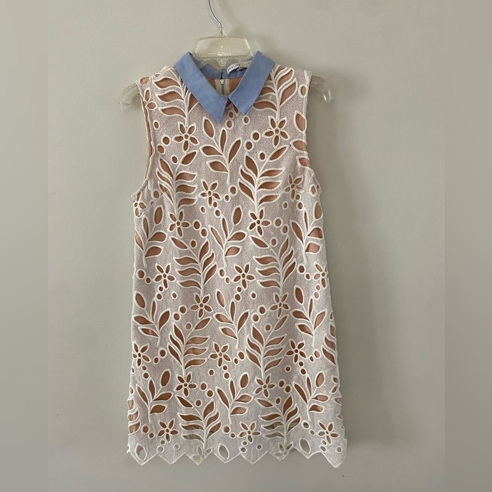 English factory Lazer cut out dress size medium